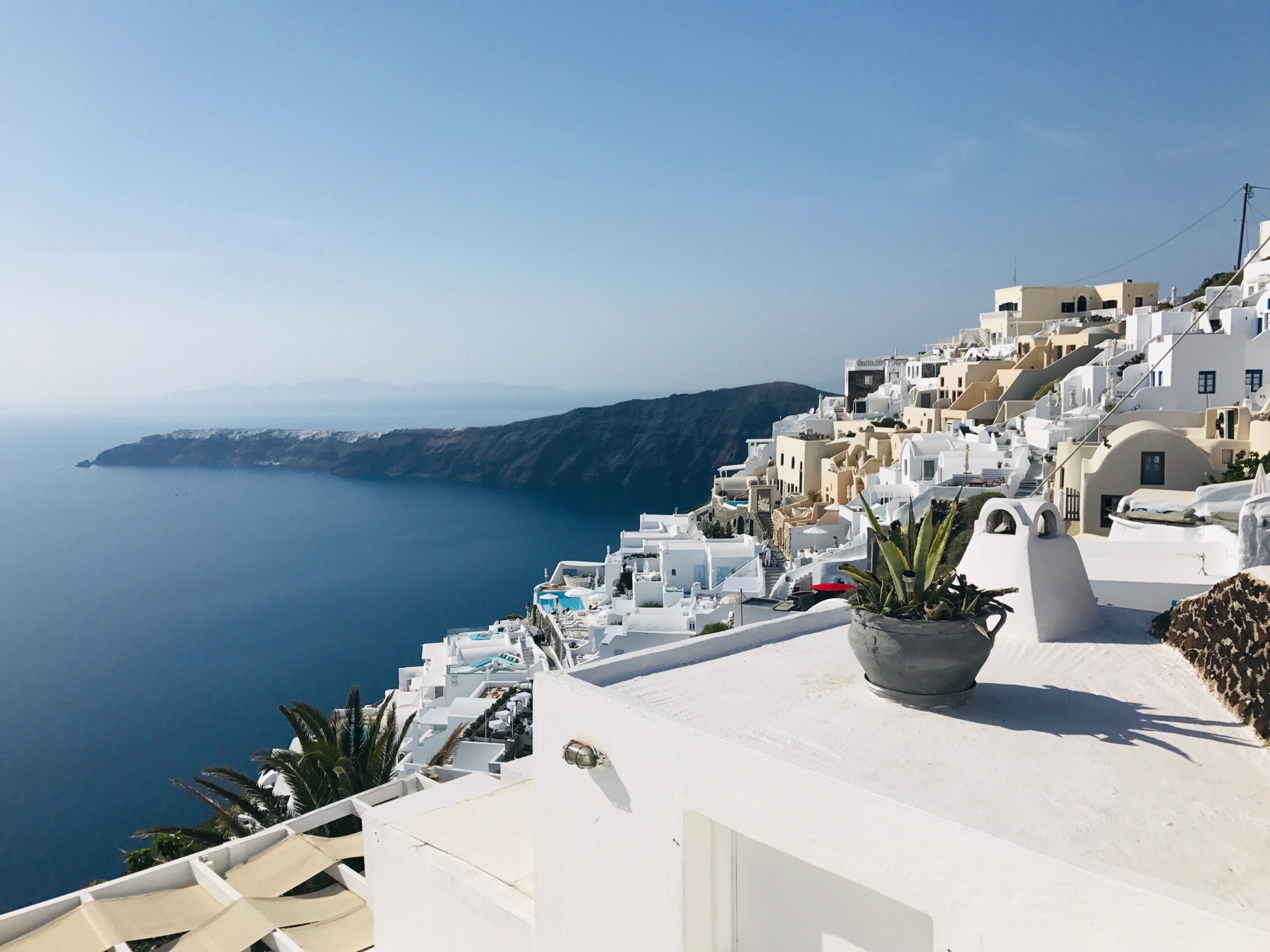 Santorini, white reflective surface help to cool down the city.
